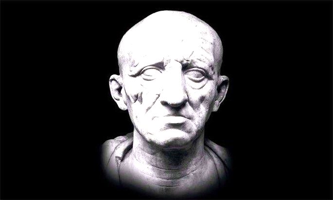 escultura romana exibindo cabeça de homem idoso